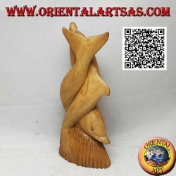 Sculpture of a pair of dolphins twisted on a 19 cm hibiscus wood reef