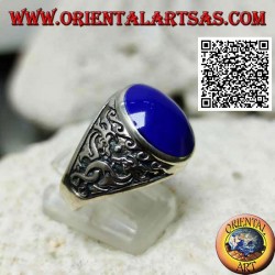 Silver ring with oval cabochon lapis lazuli and double Japanese dragon in bas-relief on the sides