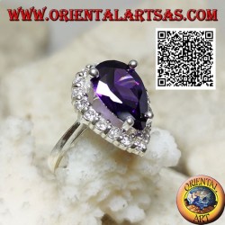 Silver ring with synthetic faceted drop amethyst set surrounded by white zircons