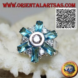 Silver ring with six petals of blue topaz and alternating central white zircons