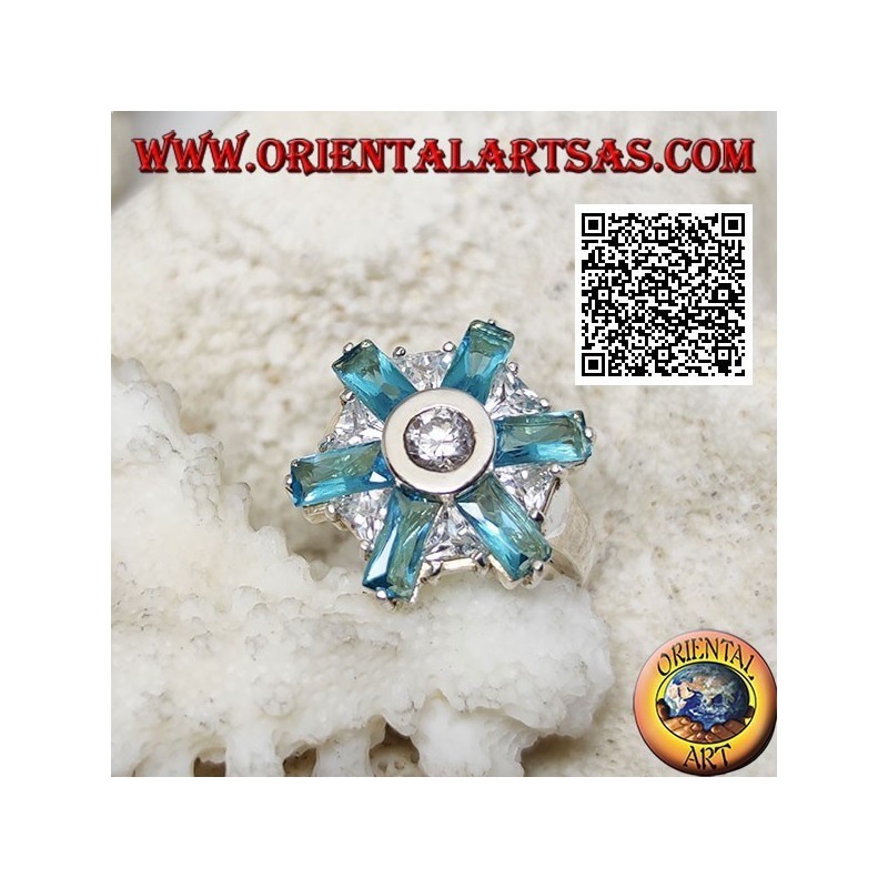 Silver ring with six petals of blue topaz and alternating central white zircons