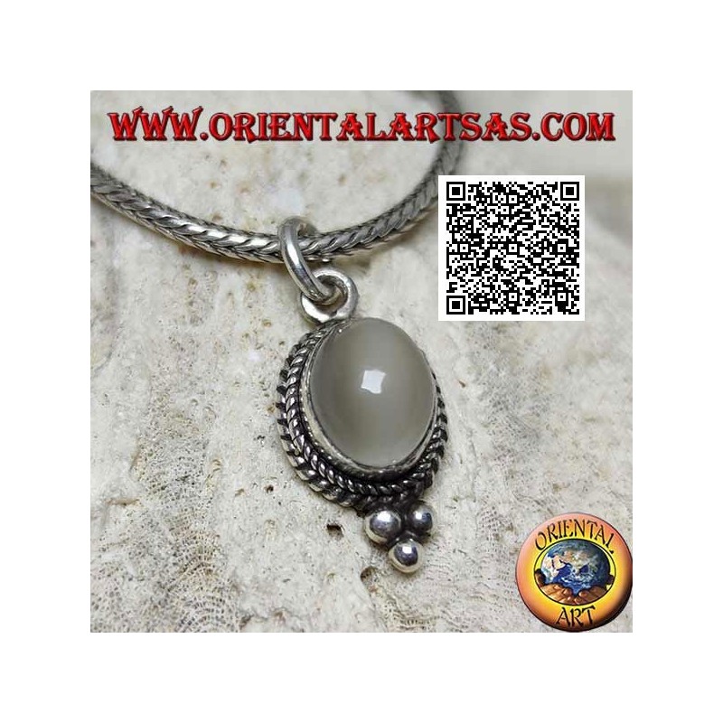 Silver pendant with oval moonstone surrounded by weaving and three balls below