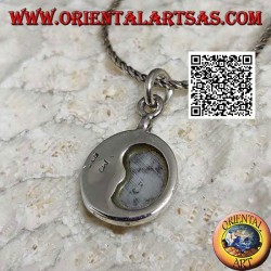 Round silver pendant with decreasing moon embraced in mother of pearl