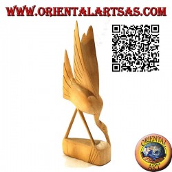 Sculpture of a feeding flamingo in 20 cm hibiscus wood