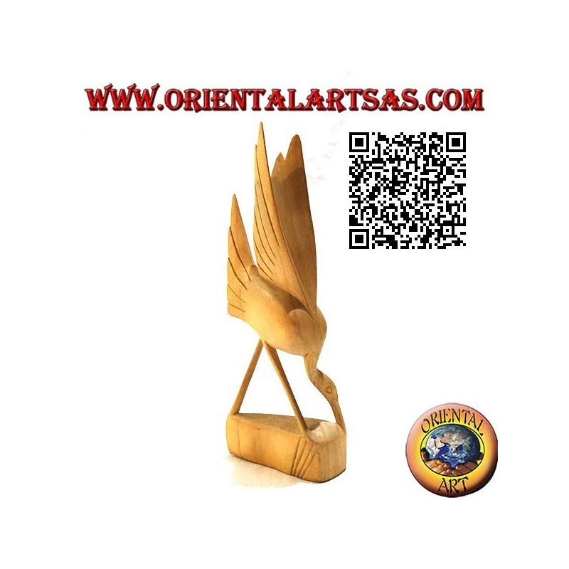 Sculpture of a feeding flamingo in 20 cm hibiscus wood