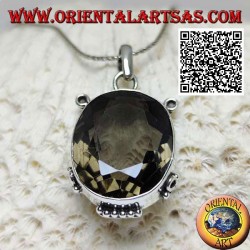 Silver pendant with beautiful faceted oval smoky quartz on smooth frame with inserts
