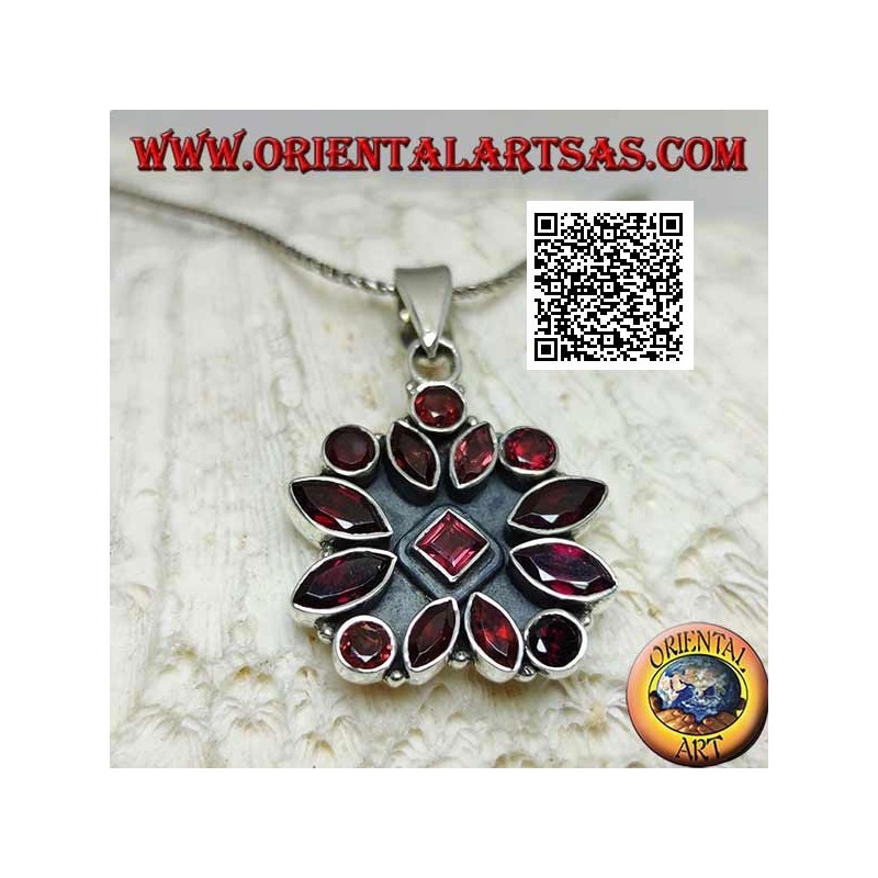 Silver pendant with square flower of 14 faceted garnets of various shapes