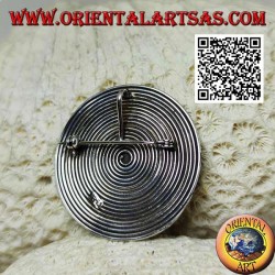 Round spiral silver brooch with central ball