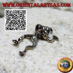 Silver pendant in the shape of a frog jointed on the center