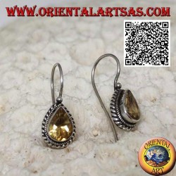 Silver earrings with natural teardrop yellow topaz surrounded by weaving