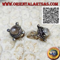 Silver earrings with round moonstone surrounded by interweaving and disks on the cardinal points