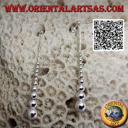 Silver lobe earrings with a row of hanging smooth growing balls