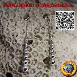 Silver lobe earrings with a row of hanging smooth growing balls
