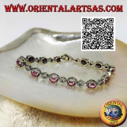 Bracelets en argent sertis de 12 rubis ovales naturels alternant avec des losanges de marcassite
