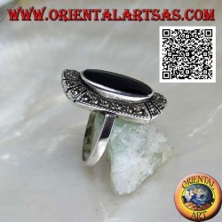 Silver ring with raised elongated oval onyx surrounded by marcasite