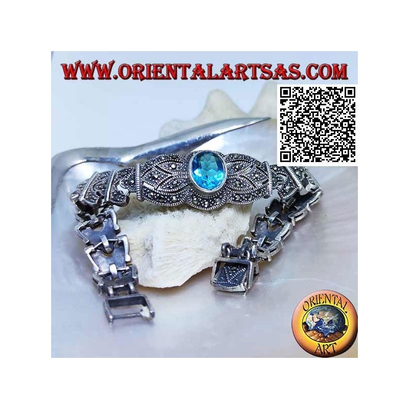 Silberne Gliederarmbänder mit großem zentralen facettierten ovalen blauen Topas, besetzt mit Markasit