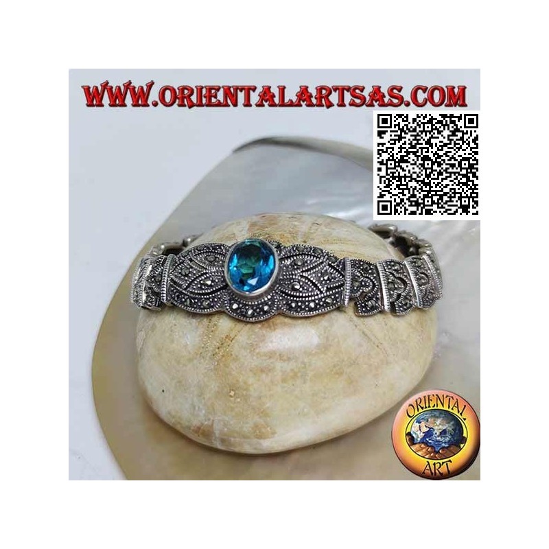 Silver link bracelets with large central faceted oval blue topaz studded with marcasite