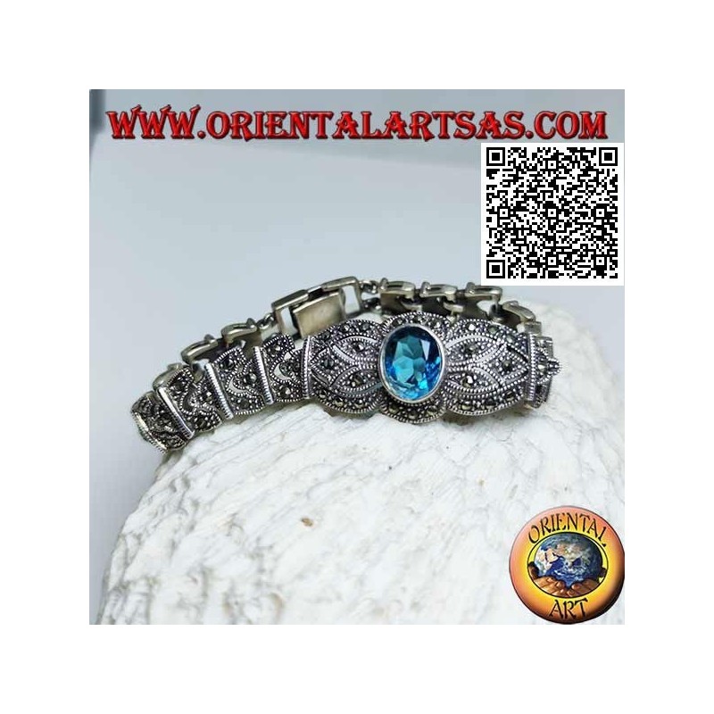 Silver link bracelets with large central faceted oval blue topaz studded with marcasite