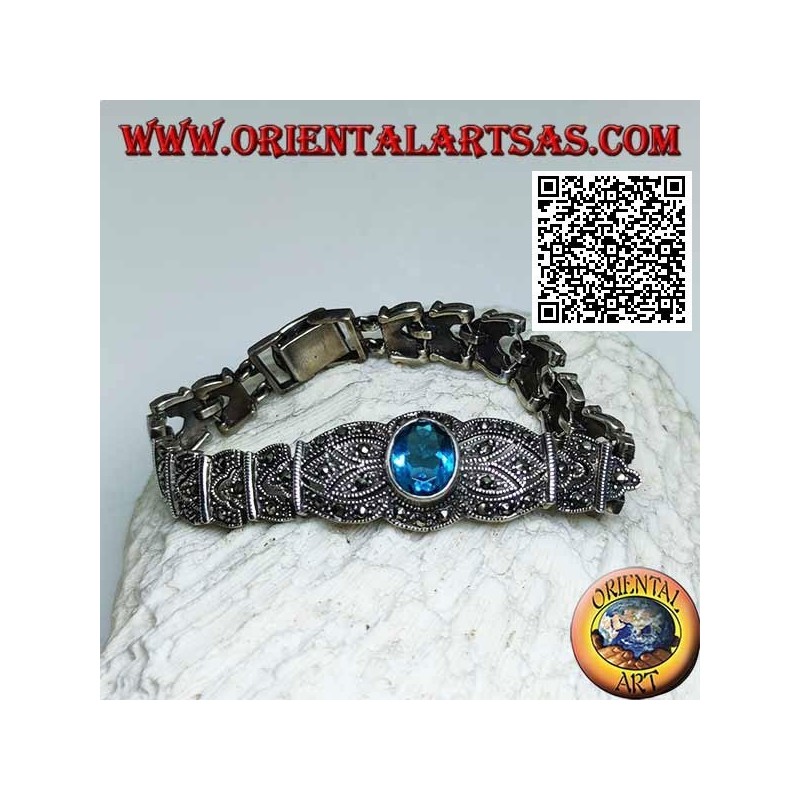 Silver link bracelets with large central faceted oval blue topaz studded with marcasite