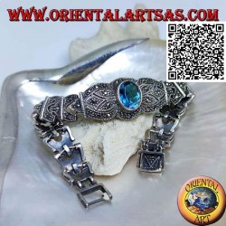 Silberne Gliederarmbänder mit großem zentralen facettierten ovalen blauen Topas, besetzt mit Markasit