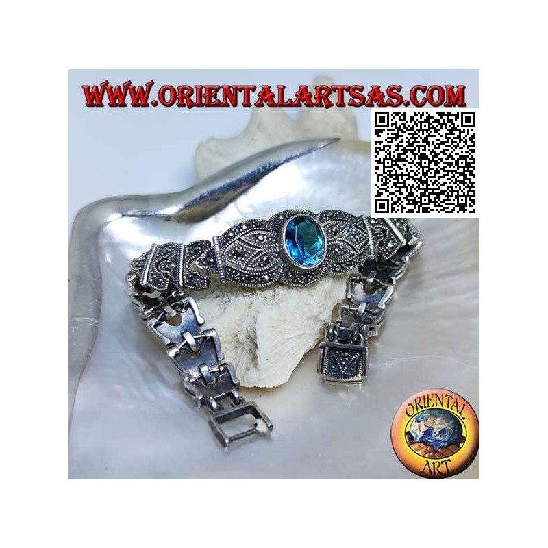 Silver link bracelets with large central faceted oval blue topaz studded with marcasite