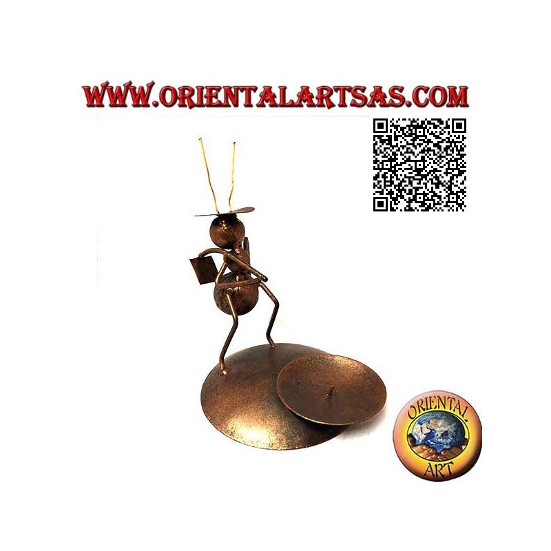 Wrought iron candle holder, peasant ant with a hoe on his shoulders