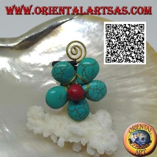 Anillo ajustable en forma de flor en pasta turquesa y centro coral con espiral de latón dorado (macramé)