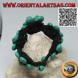 Bracelet souple avec cinq fleurs en pâte turquoise et boules en laiton doré
