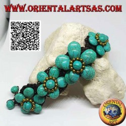 Pulsera suave con cinco flores de pasta turquesa y bolas de latón dorado