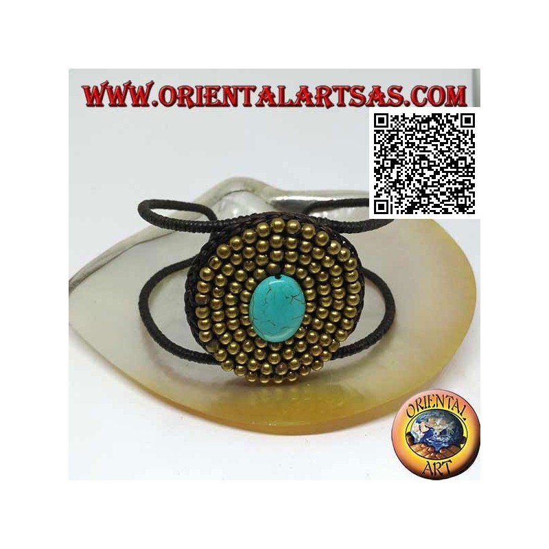 Adjustable rigid bracelet with oval turquoise paste surrounded by balls in gold-plated brass (macramé)