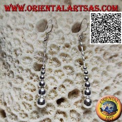 Silver leverback earrings with a row of hanging smooth growing balls