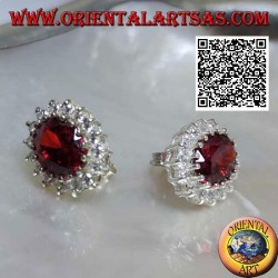 Silver lobe earrings with oval faceted garnet surrounded by white zircons
