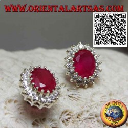 Silver lobe earrings with natural oval ruby surrounded by white zircons