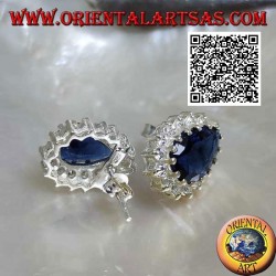 Silver lobe earrings with synthetic teardrop sapphire surrounded by white zircons