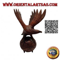 Golden eagle sculpture with spread wings standing on the world in 33 cm suar wood