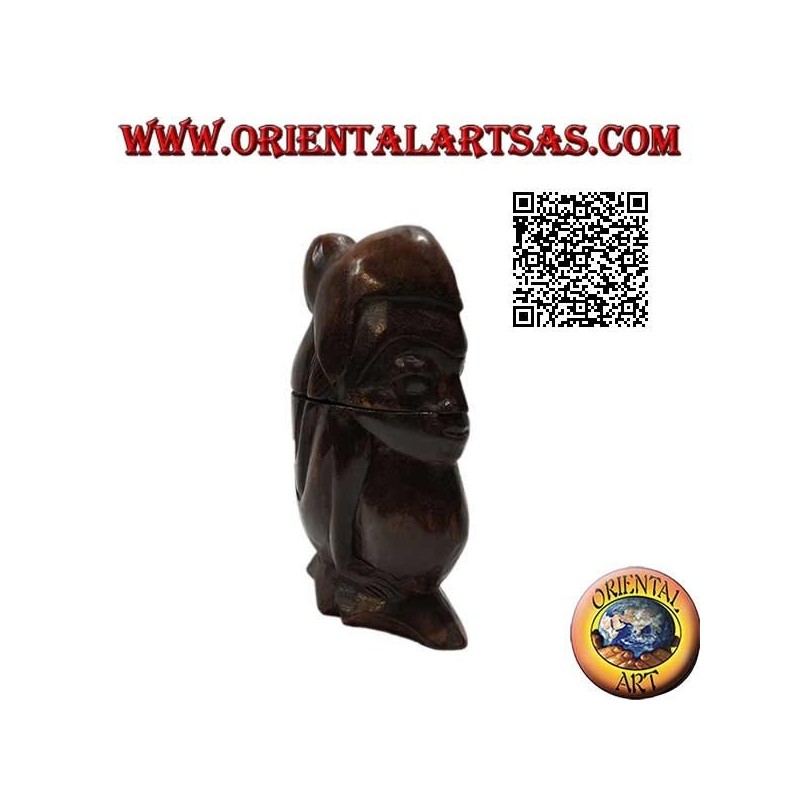 Caja en forma de mano aborigen agachada tallada en un solo bloque de madera de Suar (Lombok)