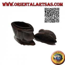 Box in the shape of a crouching aboriginal hand carved from a single block of Suar wood (Lombok)