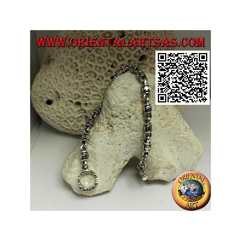 Soft silver cylinder bracelet with embossed maltese crosses alternating with rings and T-shaped clasp