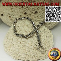 Soft silver chain bracelet with alternating rings and narrow ovals in the center and engraved clasp