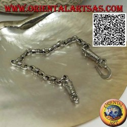 Soft silver chain bracelet with alternating rings and narrow ovals in the center and engraved clasp