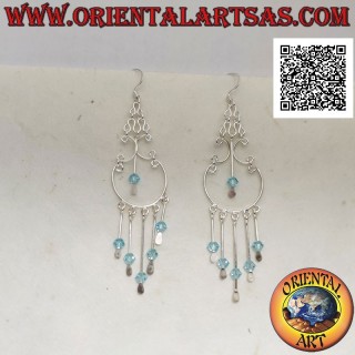 Baroque style silver hoop earrings with light blue crystals hanging in the center and below