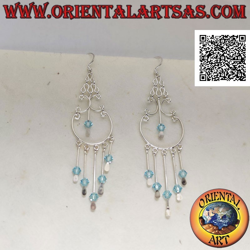 Baroque style silver hoop earrings with light blue crystals hanging in the center and below