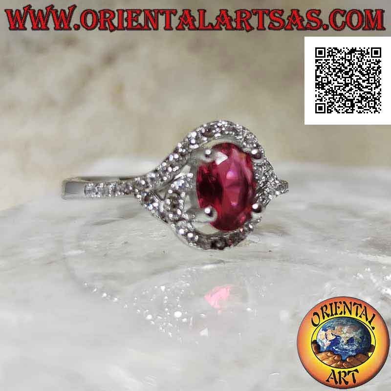 Silver ring with oval synthetic ruby wrapped in a zircon spiral