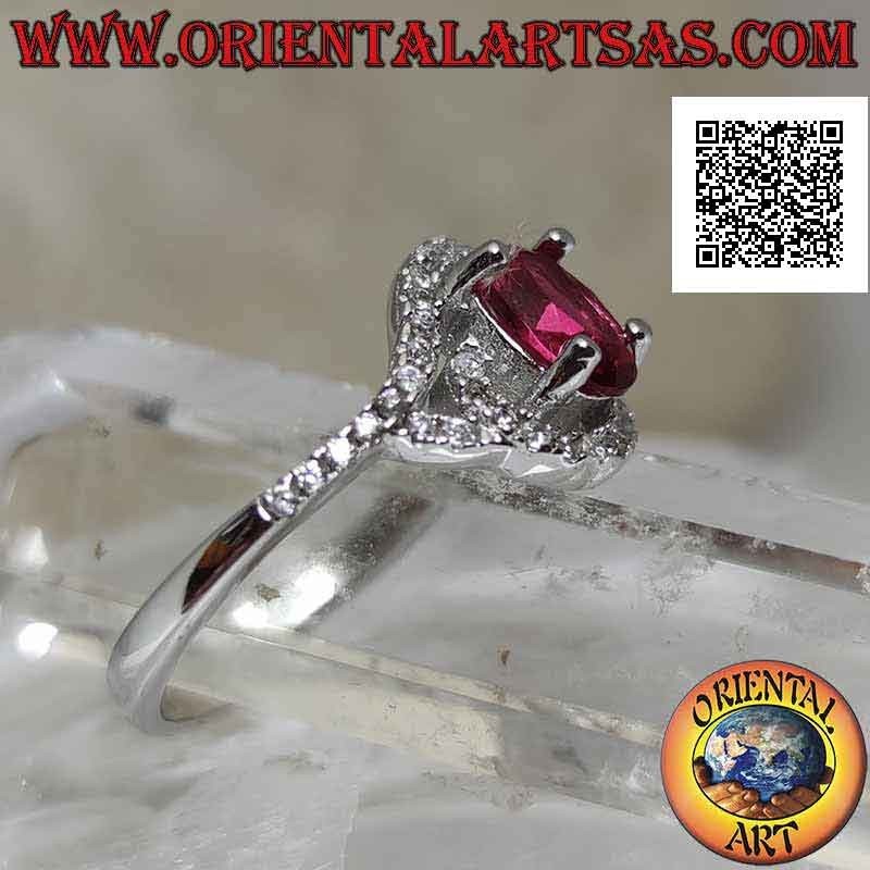 Silver ring with oval synthetic ruby wrapped in a zircon spiral