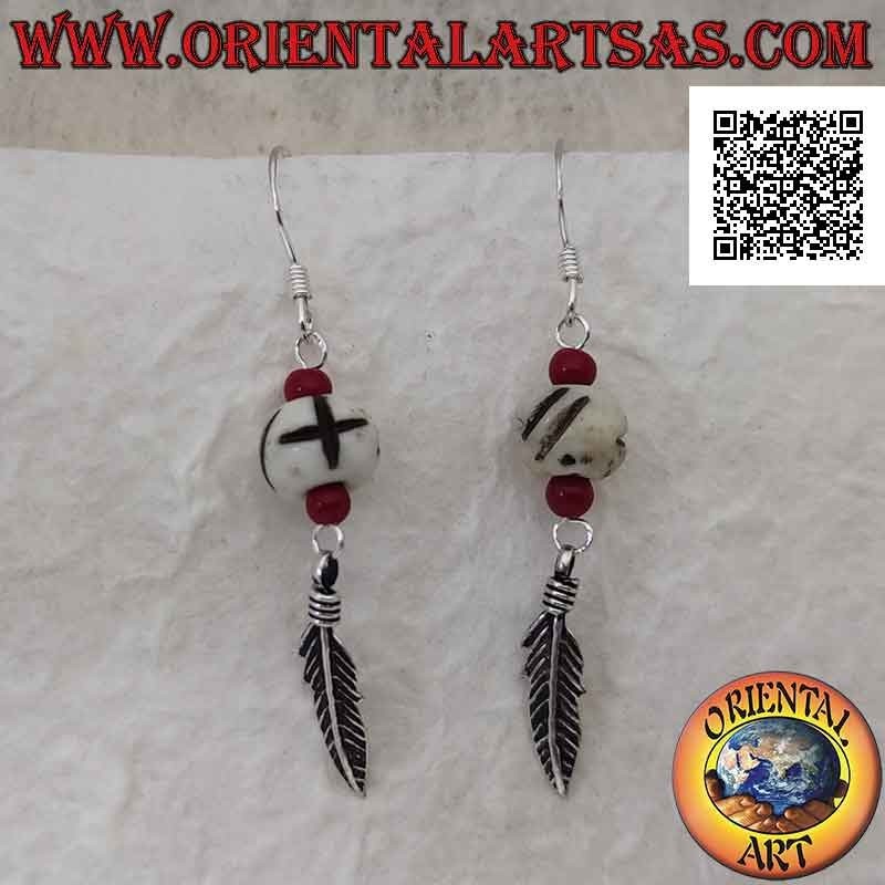 Silver earrings with white bead engraved between two coral beads and a pendant feather