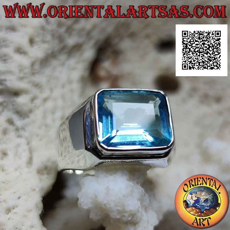 Smooth silver ring with a raised baguette-cut rectangular topaz