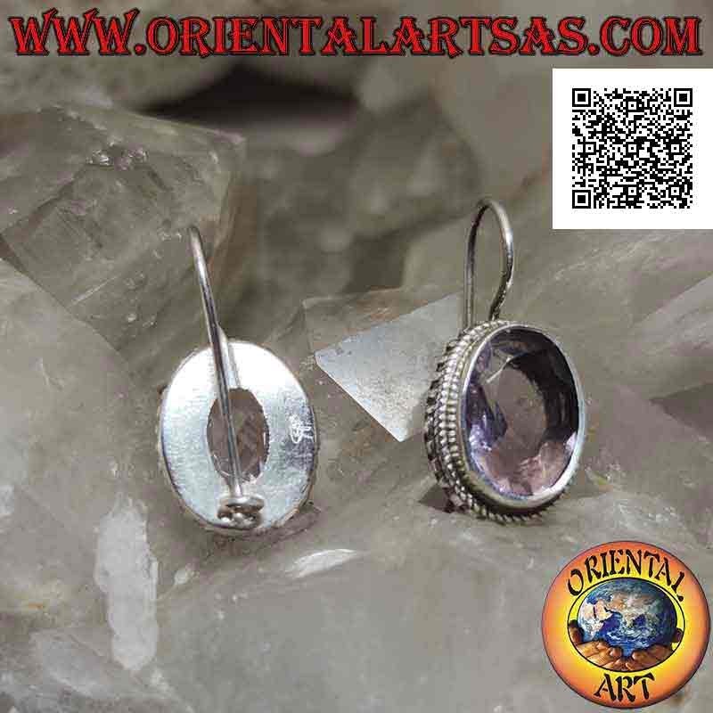 Silver earrings with natural oval faceted clear amethyst surrounded by weaving