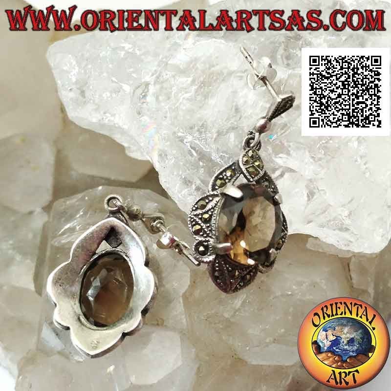 Silver earrings with faceted oval smoky topaz set on a frame studded with marcasite