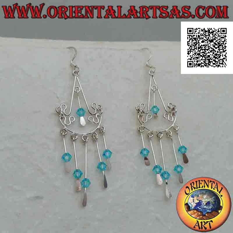 Baroque style silver arc earrings with blue crystals hanging in the center and below