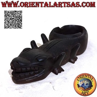 Ashtray in the shape of a reptile (Komodo dragon) in dark mahogany wood (cup on the left)